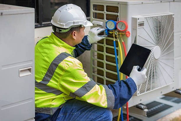 Professional Air Duct Cleaning technician working in Spirit Lake, IA
